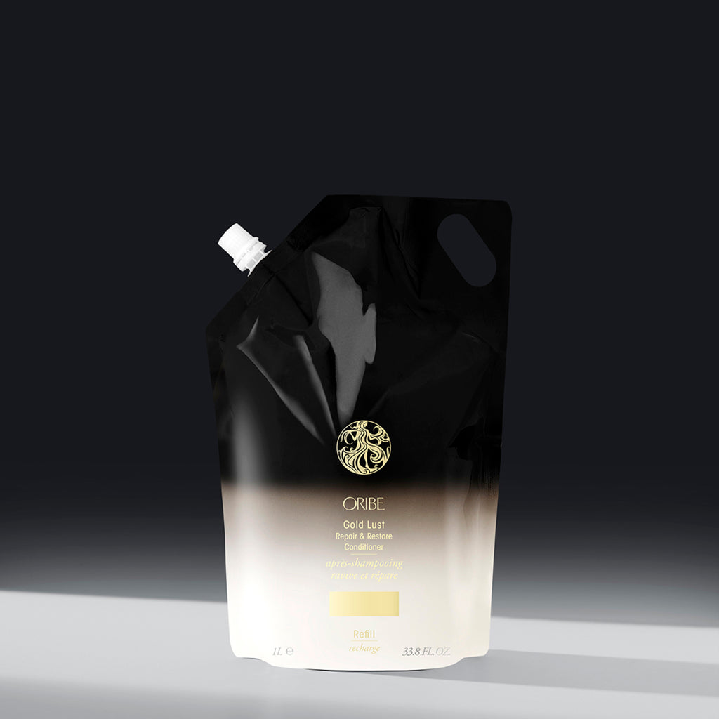 Oribe Gold Lust Connditioner / Connditionneur remplissable de la Boutique Flair, boutique de produits pour cheveux et salon de coiffure à Blainville. Ils offrent des produits tels que des shampoings sans sulfate, des masques capillaires, des gels douche, des après-shampoings. Ils sont non seulement certifiés par Bellami, mais ils offrent également des produits de plusieurs autres marques telles que Oribe Canada, T3, Iles Formula, QiQi, et bien d'autres !